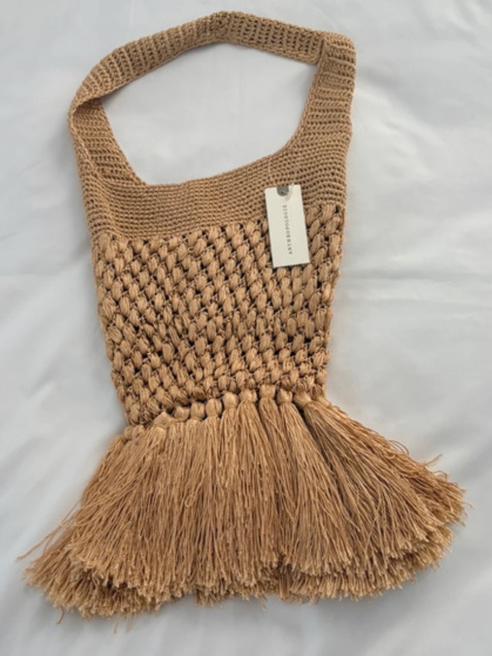 Anthropologie New Barbara
Crocheted Clutch Fringe Handbag Tie closure